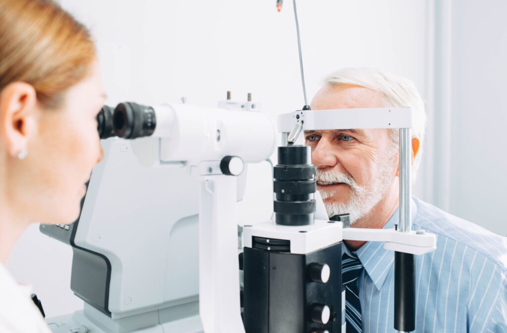 Older man getting an eye exam.