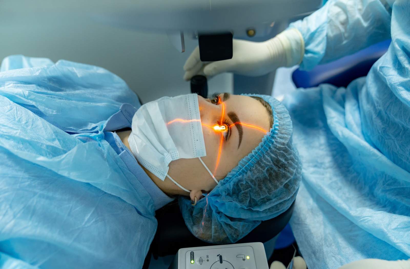 Woman undergoing laser eye surgery.