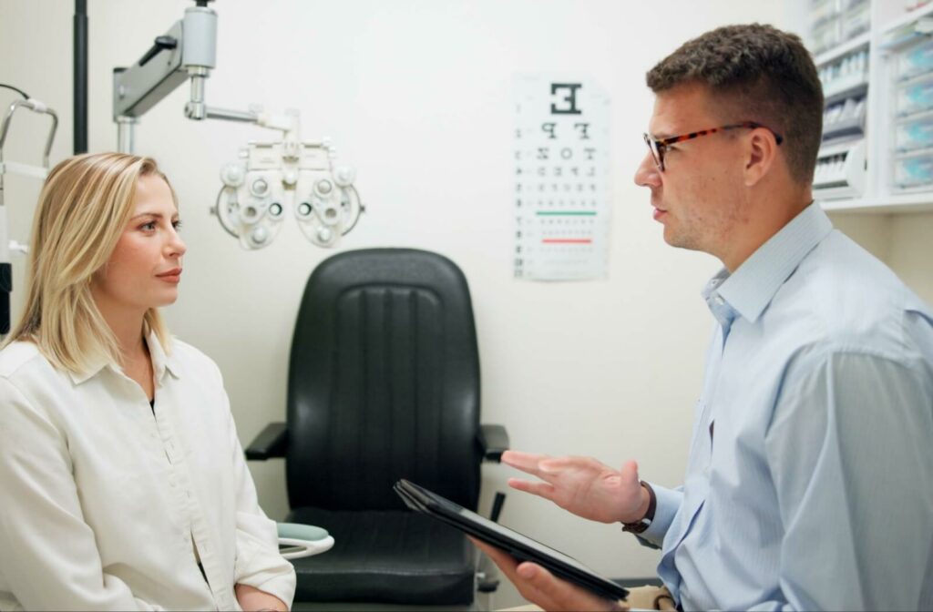 A woman consults her eye doctor about surgery options.